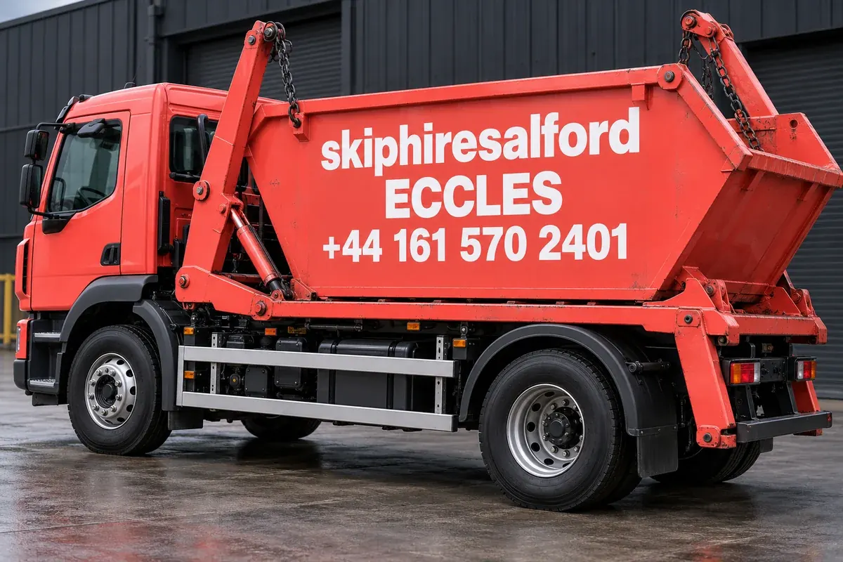 Coral truck with skiphiresalford, Eccles and +44 161 570 2401 on its container